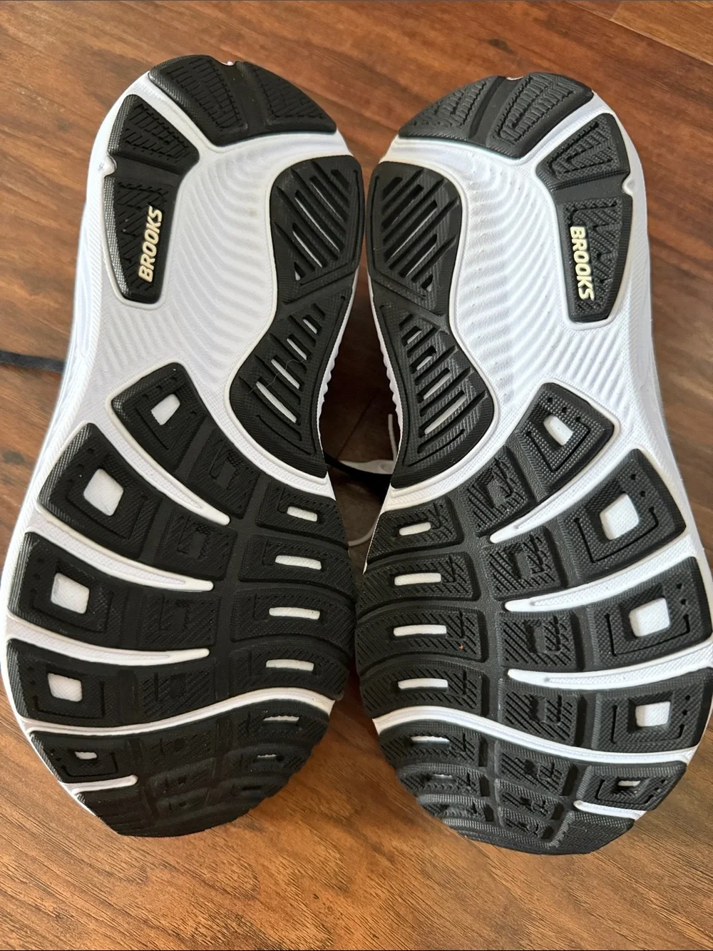Black Athletic Running Shoes with White Midsole